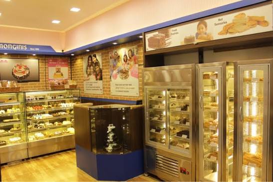 Bakery interior with tall glass chillers and wall displays